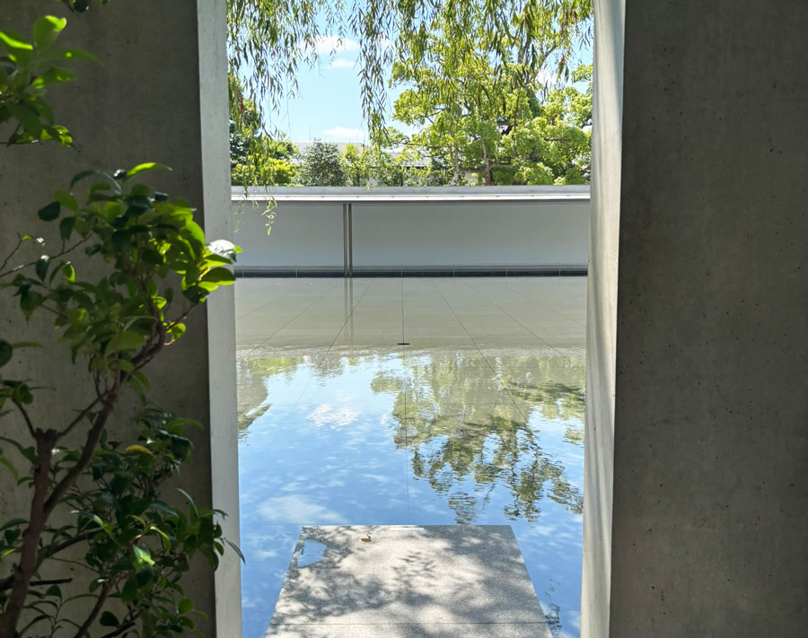 Water view through a narrow opening at the D.T. Suzuki Museum