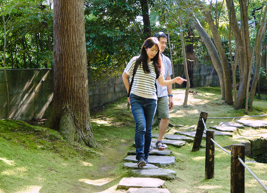 Your Kanazawa guide showing a traditional garden and sharing local stories